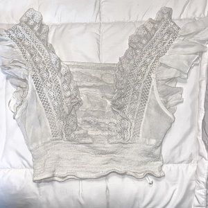 Free people summer crop top with fun sleeves! Worn a couple times. No rips/stain